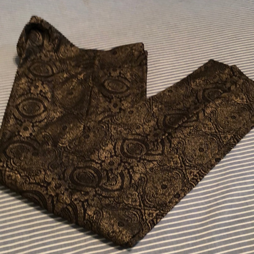 Dressy slacks in black and gold design